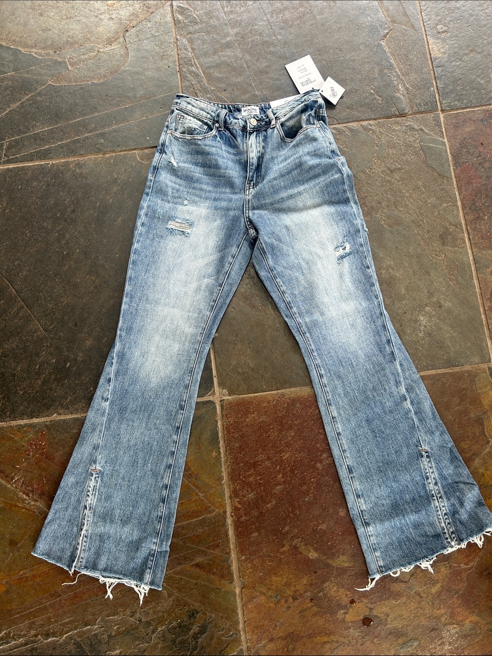 Light Blue Distressed Flare Jeans with Frayed Hem